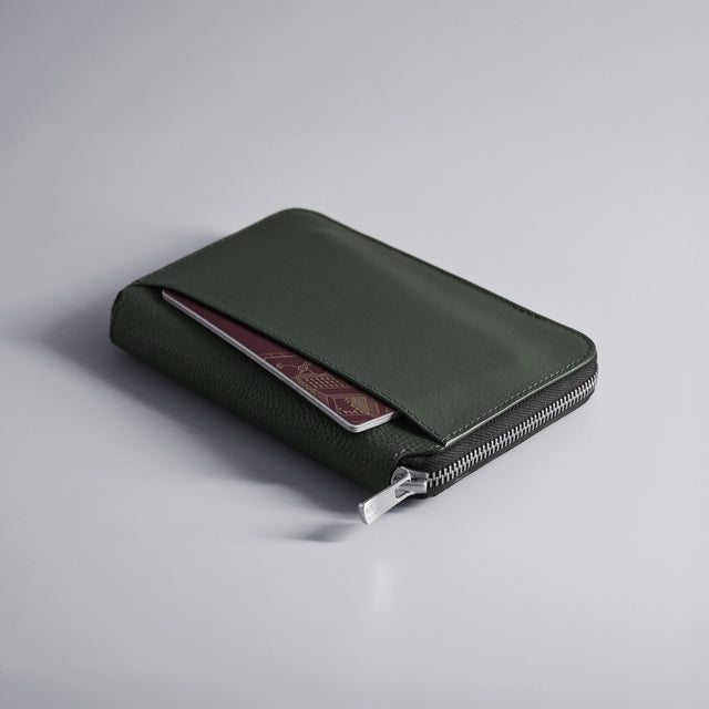 WOOLNUT Zipped leather travel organizer with dedicated compartments for passports, tickets, cash, cards, and a mini pen green leather